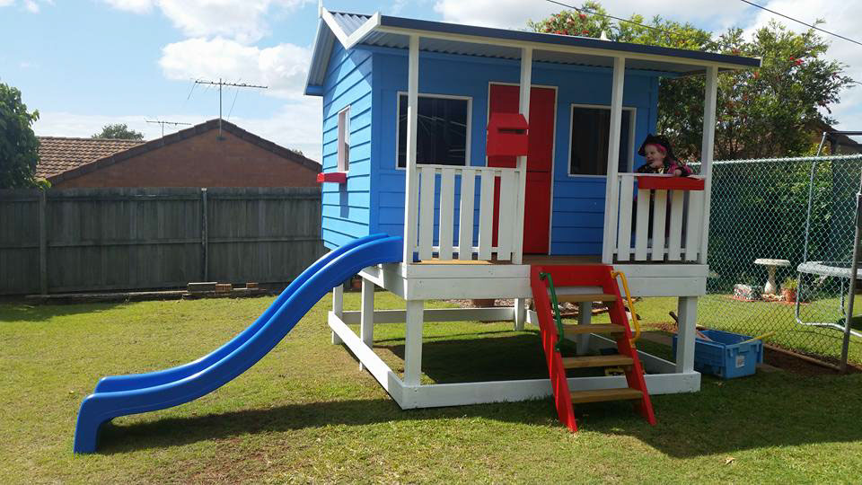 blue painted cubby house
