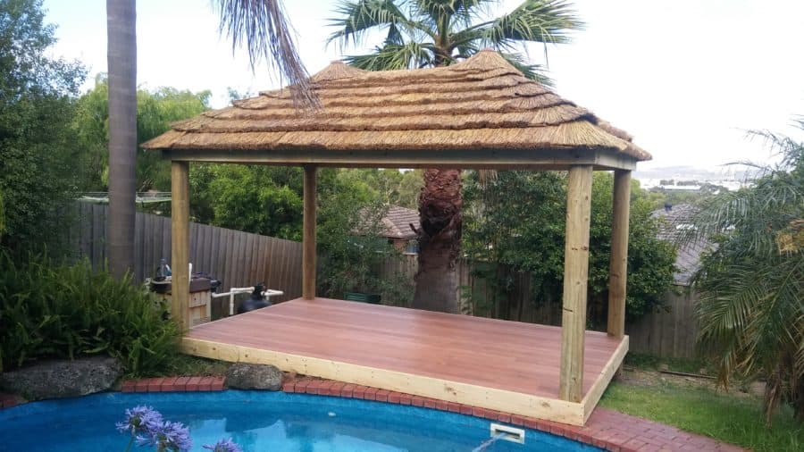 African thatch treated wood by pool